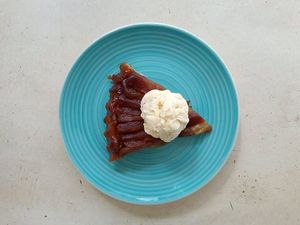 French Tarte tatin - French Apple pie with vanilla ice cream at Punto de Reunion in Merida