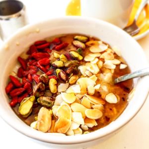 Porridge with nuts and berries and maple syrup  at The Fields Beneath in North West London