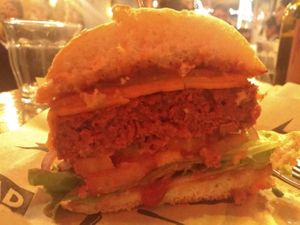 Double cheese burger. Delicious! (Sorry for the light) at Mad Mad Vegan - Chueca in Madrid