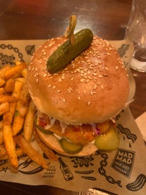 The mad nashville (with cheese) and cajun fries at Mad Mad Vegan - Chueca in Madrid