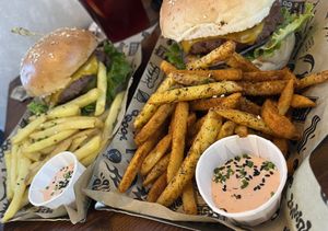 The Mad Signature Burger with cajun fries  at Mad Mad Vegan - Chueca in Madrid