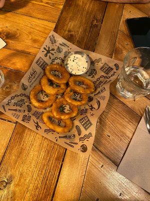 Onion rings (one left 🔥) at Mad Mad Vegan - Chueca in Madrid