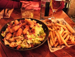 Salad and french fries at Mad Mad Vegan - Chueca in Madrid