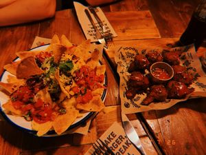 Loaded Nachos & Cauliflower Wings  at Mad Mad Vegan - Chueca in Madrid