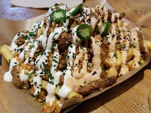 Fries and meat at Mad Mad Vegan - Chueca in Madrid