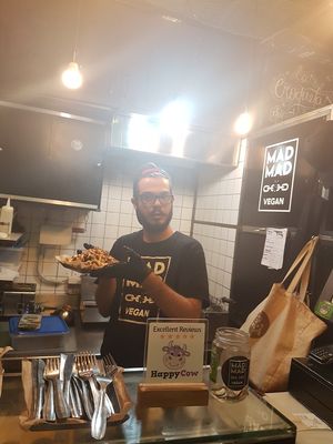 Fries incoming at Mad Mad Vegan - Chueca in Madrid
