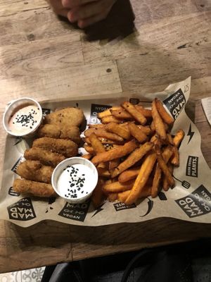 Chicken nuggets and sweet potato fries ! So good at Mad Mad Vegan - Chueca in Madrid