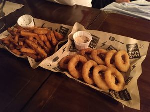 sweet potato fries and onion rings at Mad Mad Vegan - Chueca in Madrid