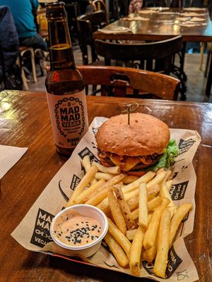 Original Mad, fries, and a Mad Mad Vegan craft beer. at Mad Mad Vegan - Chueca in Madrid