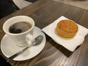 Black coffee and carrot cake  at Anhelo in Naples