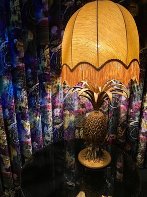 Welcoming pineapple table  lamp in ground floor bar at Cookies Cream in Berlin
