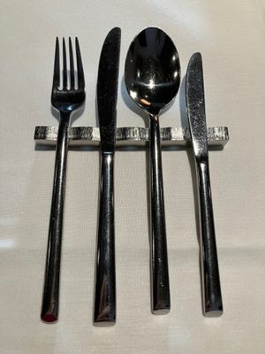 Rack of utensils at Cookies Cream in Berlin