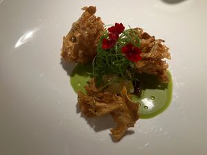 Fermented pointed cabbage stuffed with Koshihikari rice, served with deep-fried hen-of-the-woods mushrooms at Cookies Cream in Berlin