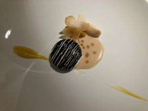 Not a dessert: celeriac stuffed with macadamia puree, served with lemon citrus sauce, smoked celeriac puree, and blood orange + yuzu paste at Cookies Cream in Berlin