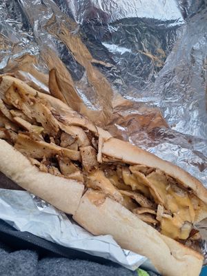 Seitan cheese steak, on the right with cheese wiz at Savory Leaf Cafe in Trenton