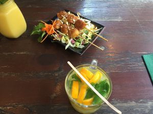 Satay starter, orange and ginger tea, summer breeze shake  at Tiato in Berlin