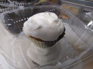 Vegan Neopaliton Cupcake. Strawberry cupcake with chocolate and white chocolate liner at Jordan's Girls Gourmet Dawgs in Columbus