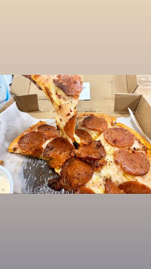 classic pepperoni  at Pythagoras Conscious Food Philosophy in Houston