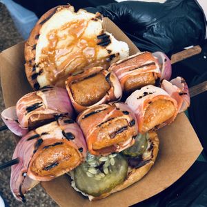 Bacon wrapped sausage kabobs  at Pythagoras Conscious Food Philosophy in Houston