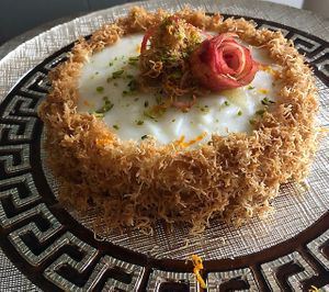Greek style cheese cake with Persian baklava crunchy crust. (sold by slice) at Pythagoras Conscious Food Philosophy in Houston