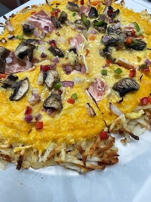 Hashed browns Bacon Egg and Cheese Pizza
The Ultimate Breakfast Pizza!!! Golden crispy potato hashed browns For the Crust! baked with Just Egg, Violife cheddar cheese and smoked b at Pythagoras Conscious Food Philosophy in Houston