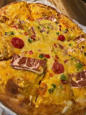 Veggie Breakfast Pizza
Your choice of 10" House Made crust made with Non-GMO NEVER BLEACHED NEVER BROMATED flourt, baked with Violife cheddar cheese, Just Egg, spinach, mushrooms, at Pythagoras Conscious Food Philosophy in Houston