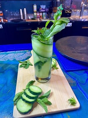 Terrarium
Fresh squeezed lime juice muddled with fresh mint leaves, fresh basil, fresh cucumber, simple syrup, and Rum topped off with Purreza sparking water at Pythagoras Conscious Food Philosophy in Houston