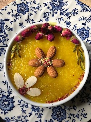 Saffron Rice Pudding
Famous Sweet, creamy saffron rice pudding AKA (Sholehzard) made with rose water, Persian saffron, cardamom, and topped with almond, pistachio and cinnamon. at Pythagoras Conscious Food Philosophy in Houston