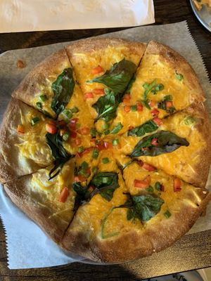 Veggie breakfast pizza, minus the mushrooms and onions  at Pythagoras Conscious Food Philosophy in Houston