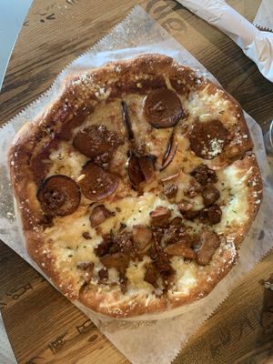 Annoying vegan pizza  at Pythagoras Conscious Food Philosophy in Houston