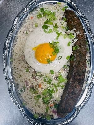 Fried Rice with kabob and sunny side up at Pythagoras Conscious Food Philosophy in Houston