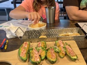 Jalapeño poppers and queso   at Pythagoras Conscious Food Philosophy in Houston