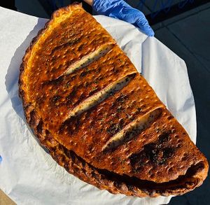 X-Large Pepperoni Calzone at Pythagoras Conscious Food Philosophy in Houston