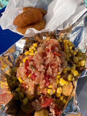 Hot water cornbread and fried okra bowl at Sassy's Vegetarian Soul Food in Austin