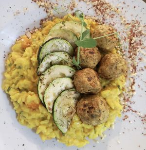 Vegan coconut Curry rice topped with zucchini and falafel  at Kat's Kitchen Brunch Club in Split
