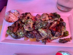 Brussels sprouts starter with almonds on the side per request 😋   at Luna Red in San Luis Obispo