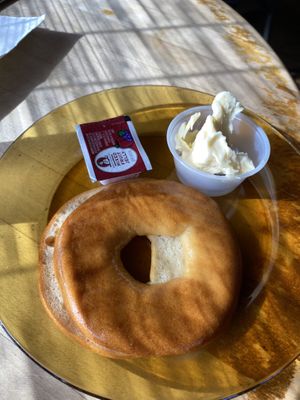 Gluten free, vegan bagel with vegan butter  at Drunken Monkey Coffee Bar in Orlando