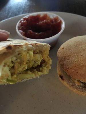Vegan burrito and sausage sandwich  at Drunken Monkey Coffee Bar in Orlando