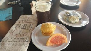 Nitro cold brew, vegan biscuit and "egg" sandwich & vegan blueberry/earl grey scone at Drunken Monkey Coffee Bar in Orlando