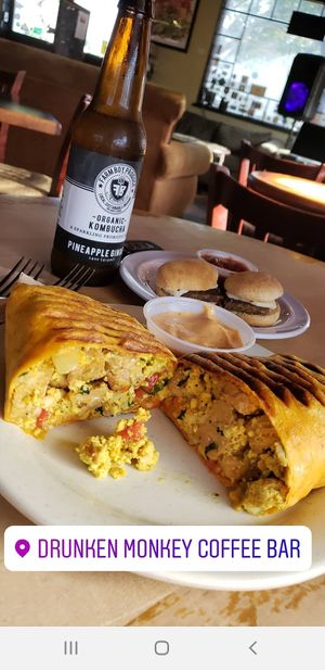Breakfast wrap and sausage biscuits with cheeze at Drunken Monkey Coffee Bar in Orlando