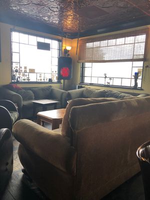 Lounge area next to dinning area  at Drunken Monkey Coffee Bar in Orlando