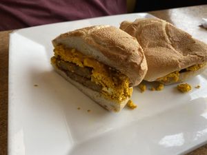 Vegan Bacon or Sausage, Scrambled Tofu & Vegan Cheese on a Hard Roll at Colony Diner in Wallingford