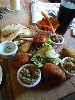 Vegan platter - olive tapenade, hummus, pitta, BBQ cauliflower, croquettes at The Old Lodge in Stroud