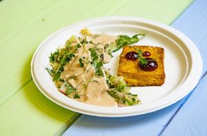 tofu steak & crunchy salad with nut souse. at Veggie Bar in Minsk