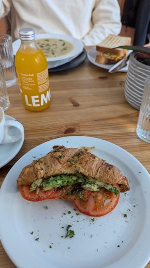 Tomato pesto, avocado and tomato filled croissant, hot chocolate, cauliflower soup and cheesy tempeh sandwich at The Sly Fox in Edinburgh