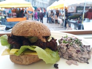 Homemade seitan strips burger in a homemade bun with dairy free coleslaw, cheese, lettuce and smoked tofu sauce at The Sly Fox in Edinburgh