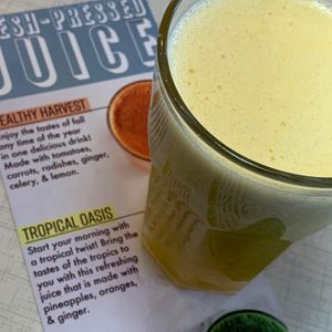 Tropical Oasis: Fresh-Pressed Juice with Pineapples, Oranges & Ginger at Anna's House in Kalamazoo