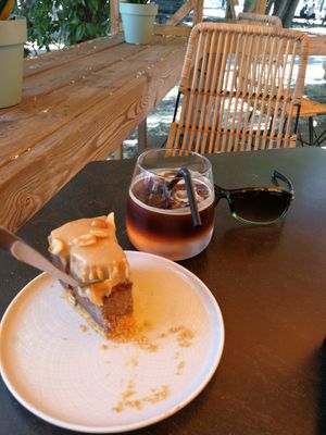 Snickers our with espresso spritzer on beautiful patio at KIRAS - Pylimo in Vilnius