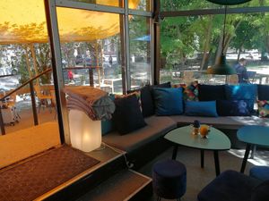 Gorgeous indoor and outdoor seating at KIRAS - Pylimo in Vilnius