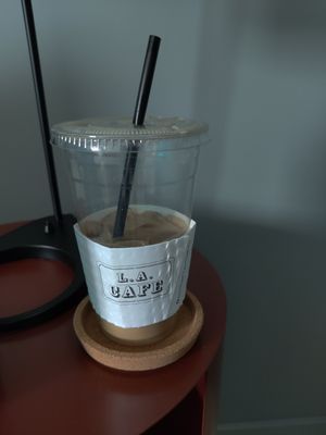 Large latte with oat milk that was excellent at LA Cafe in Los Angeles